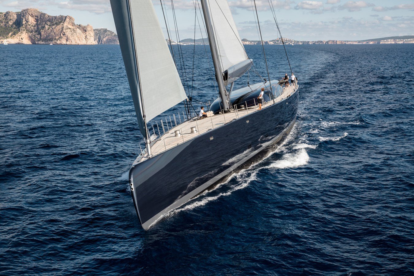 Original photograph of sailing yacht NGONI viewed from the bow while sailing at sea.